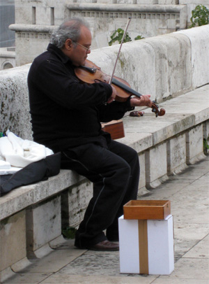 Street violinist in Budapest, Hungary.